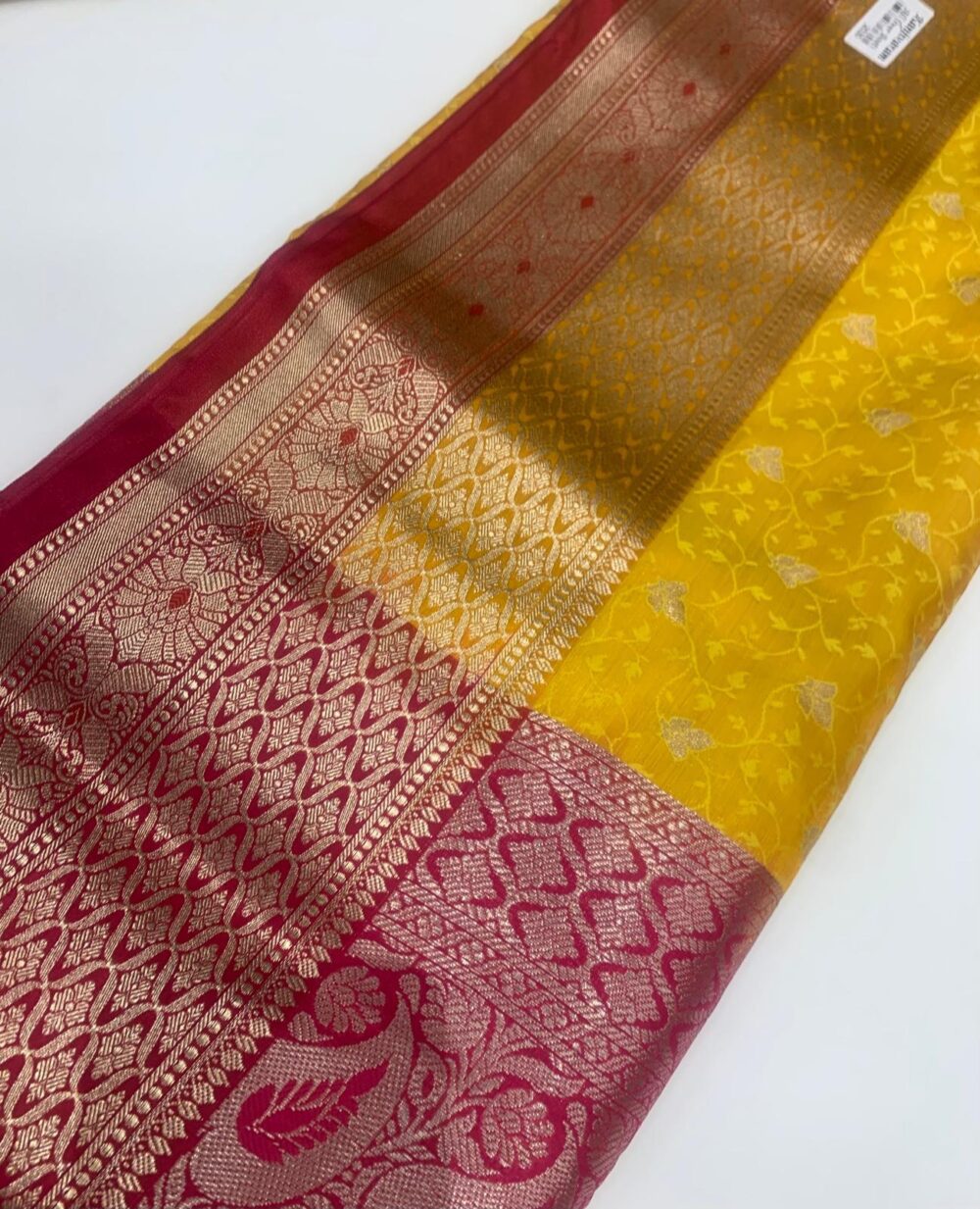 Stunning mustard yellow and pink traditional looking saree. - Image 2